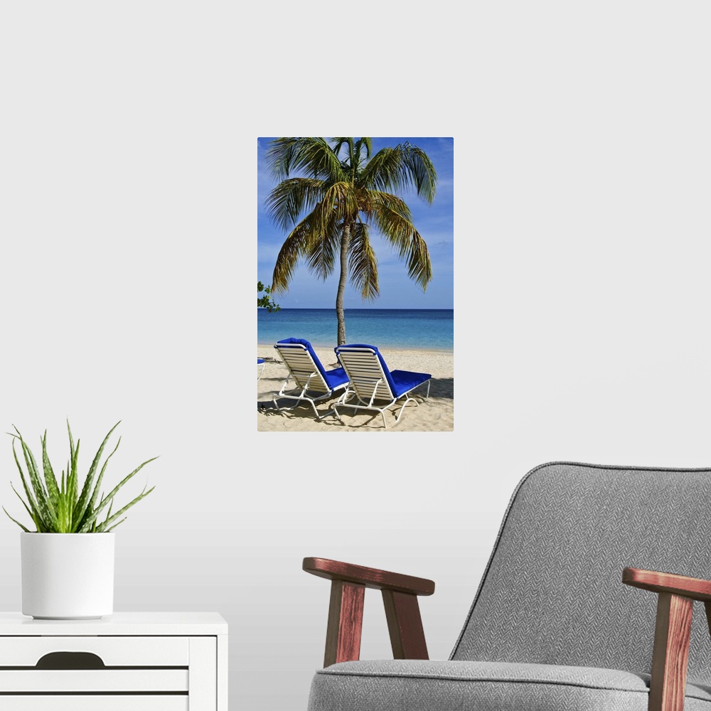 A modern room featuring Grenada. Beach chairs on Grand Anse Beach Grenada