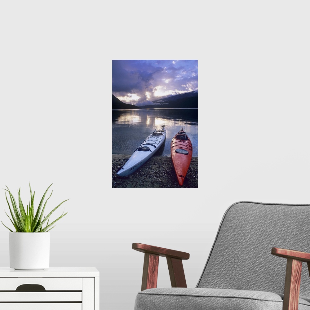 A modern room featuring Kayaks at sunset on Rainbow Falls Beach on Azure Lake in Wells Gray Provincial Park, British Colu...
