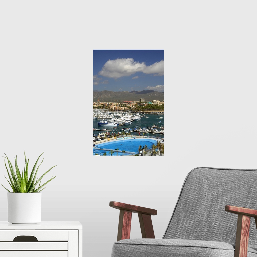 A modern room featuring North America, Mexico, State of Baja California Sur, Cabo San Lucas. Overview of harbor area with...