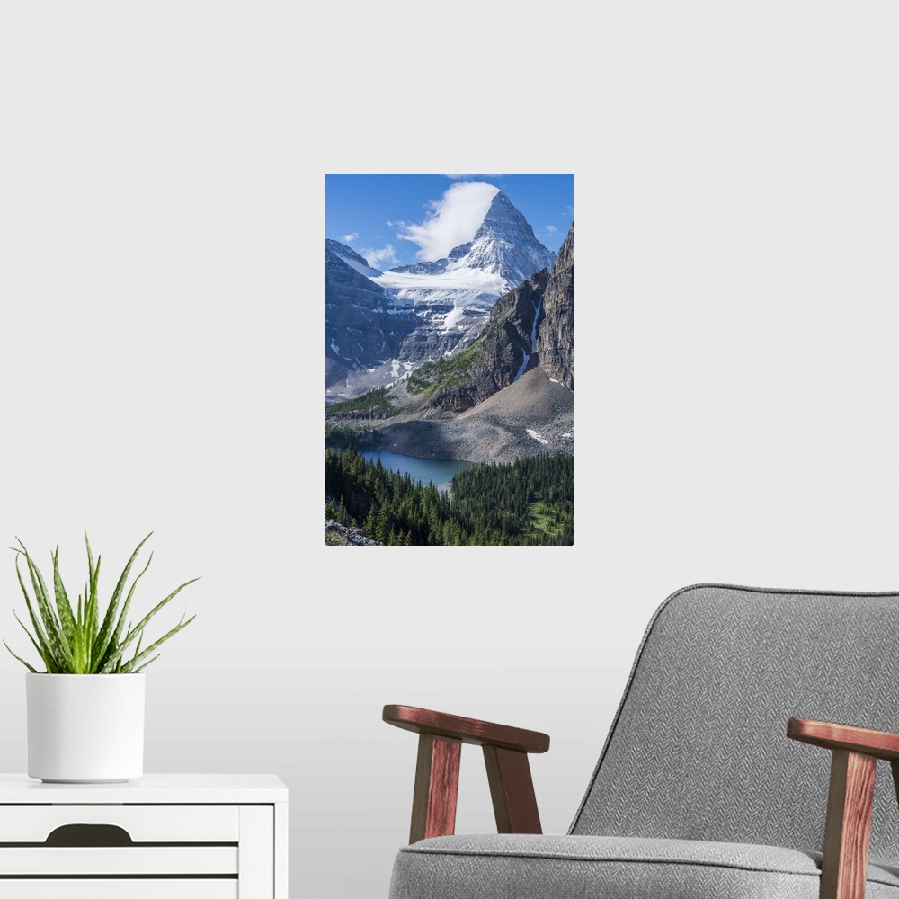 A modern room featuring Mt. Assiniboine and Sunburst Lake as seen from the Nublet.
