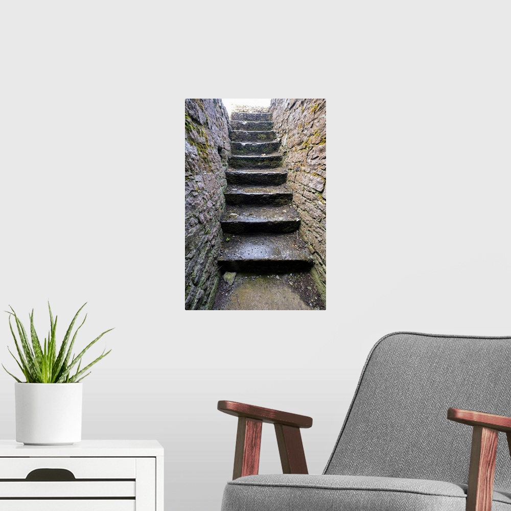 A modern room featuring Ross Errily Friary. Located in County Clare, Ireland. These ancient stairs lead to a room that no...