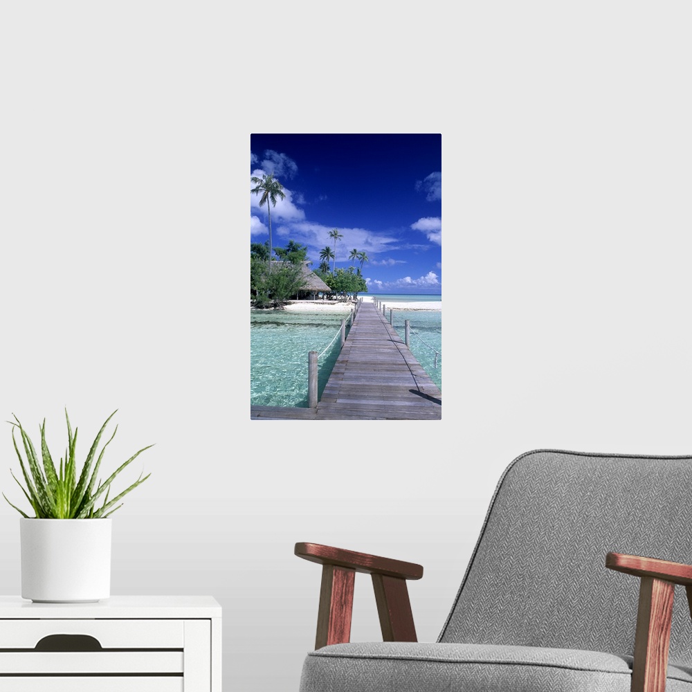 A modern room featuring The perfect scene of wooden dock walkway over water in beautiful Tahiti in Bora Bora, French Poly...