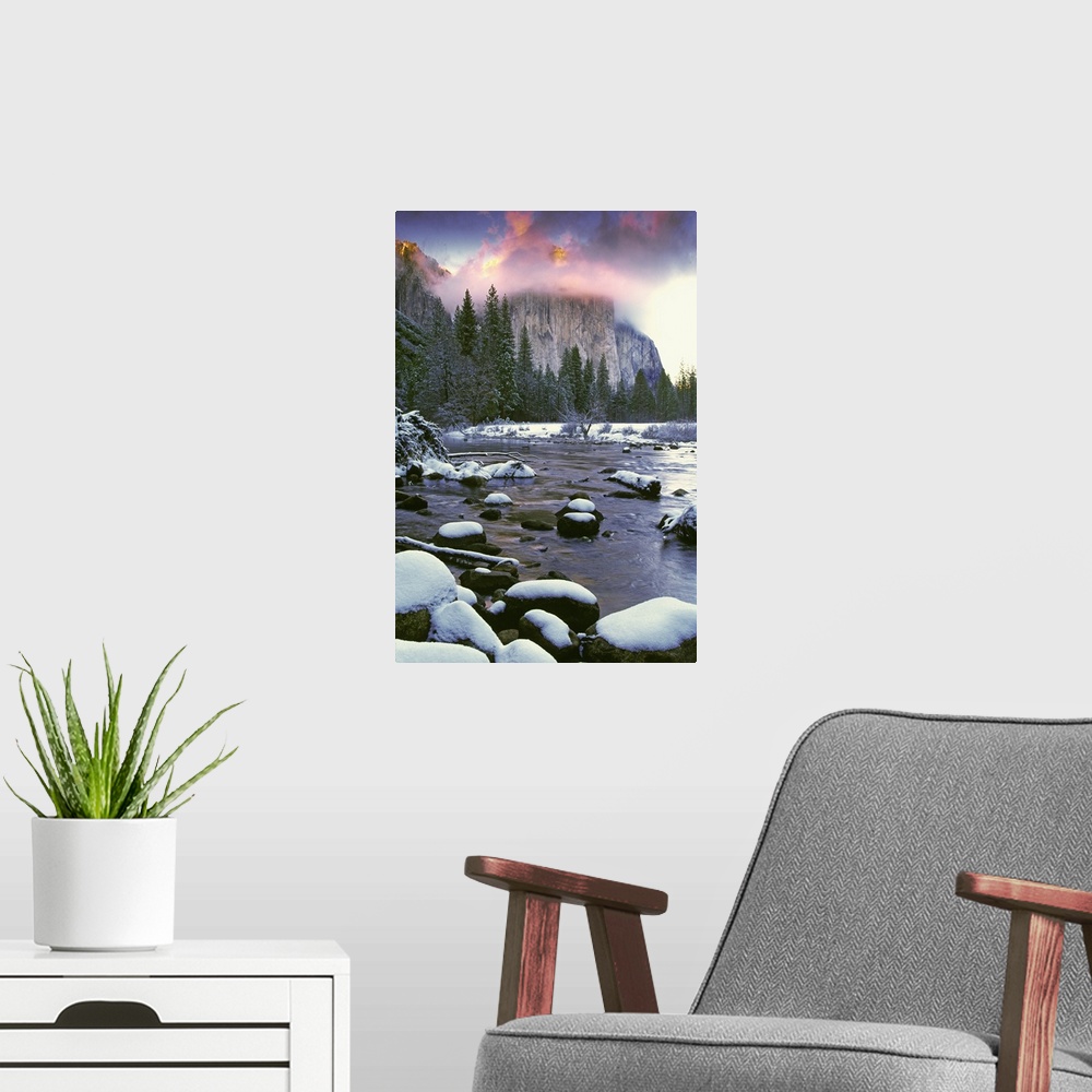 A modern room featuring USA, California, Yosemite National Park. Sunlight on clouds over El Capitan as seen from the Merc...