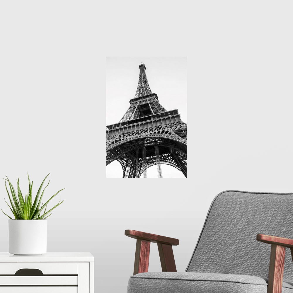A modern room featuring The famous Eiffel tower in Paris. Black and white photo.