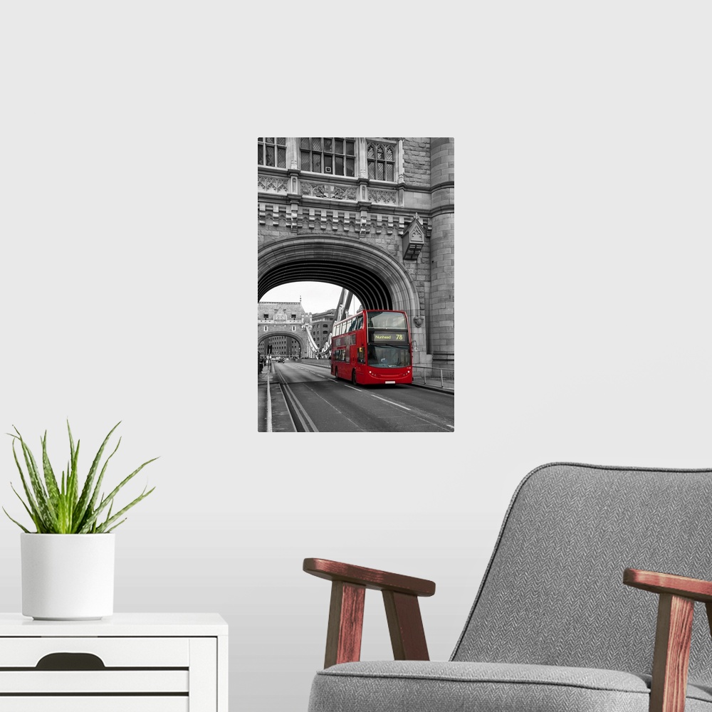 A modern room featuring Red London bus passing over Tower Bridge in black and white with selective color.