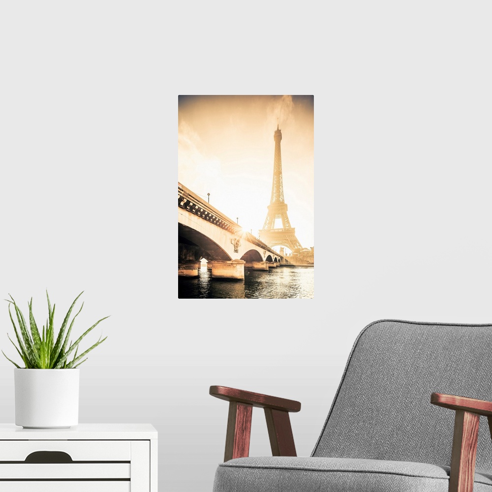 A modern room featuring France, Ile-de-France, Seine, Ville de Paris, Paris, Invalides, The Eiffel Tower at sunrise.