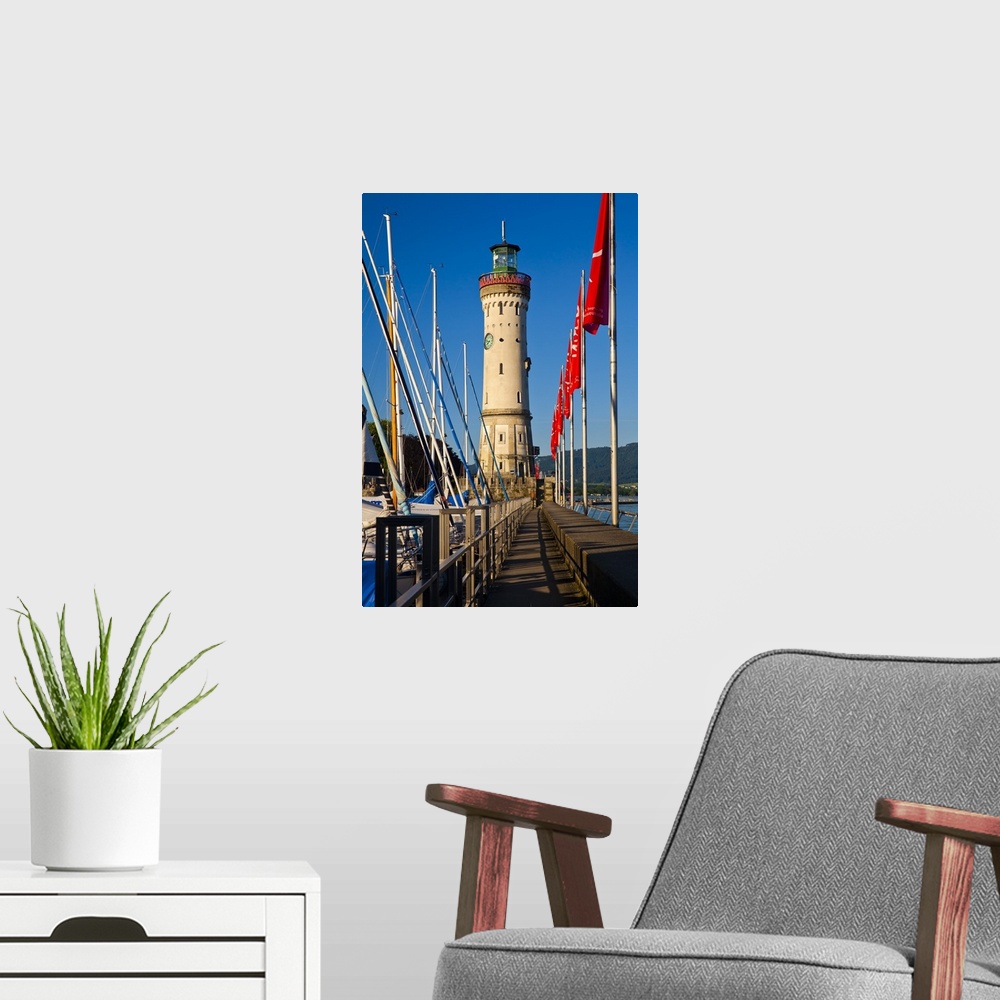 A modern room featuring Germany, Bavaria, Lake Constance, Swabia, Schwaben, Lindau, Lighthouse at the harbor entrance.