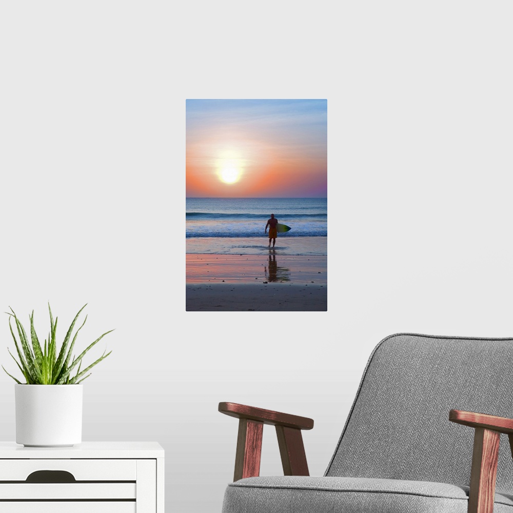 A modern room featuring Indonesia, Bali Island, Jimbaran, Surfer on the beach at sunset