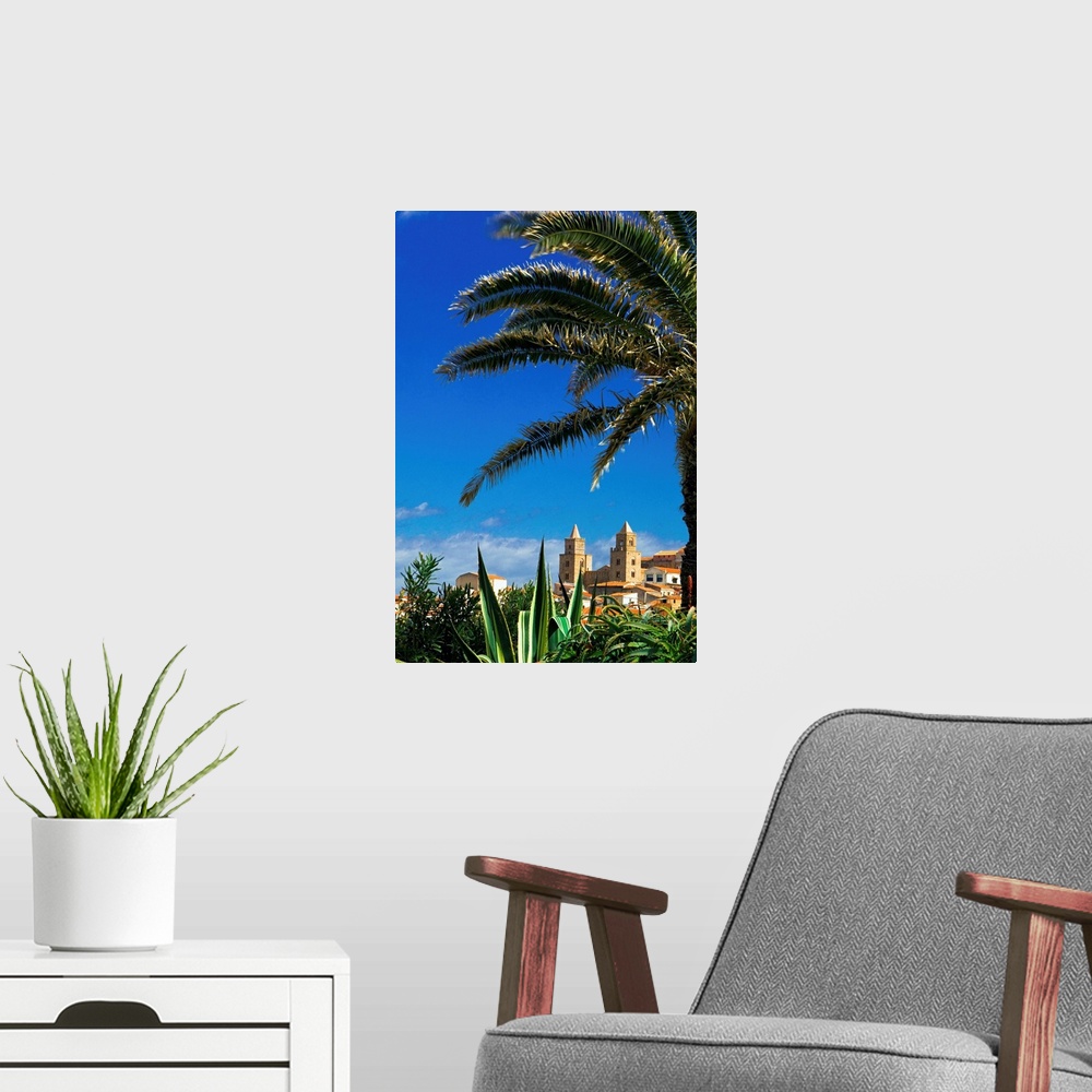 A modern room featuring Italy, Italia, Sicily, Sicilia, Cefal., palm tree and cathedral in background