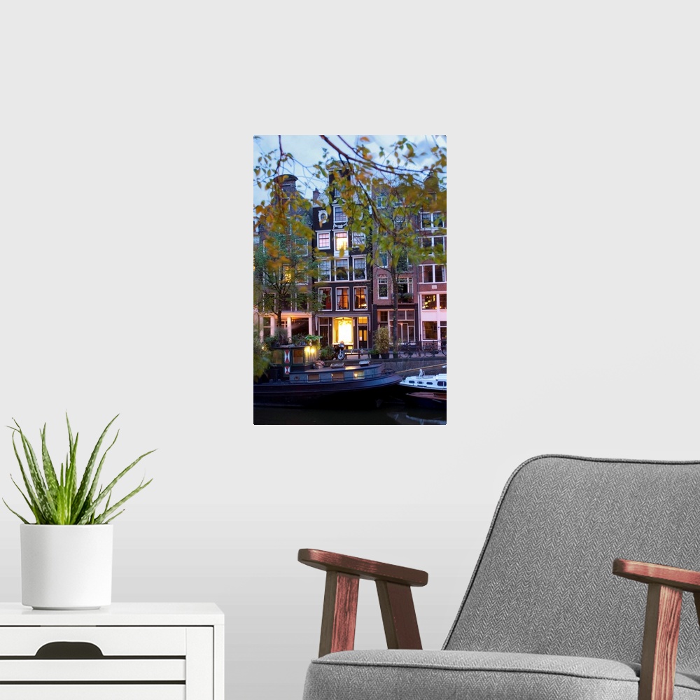 A modern room featuring Netherlands, Nederland, North Holland, Noord-Holland, Amsterdam, night view of the canal