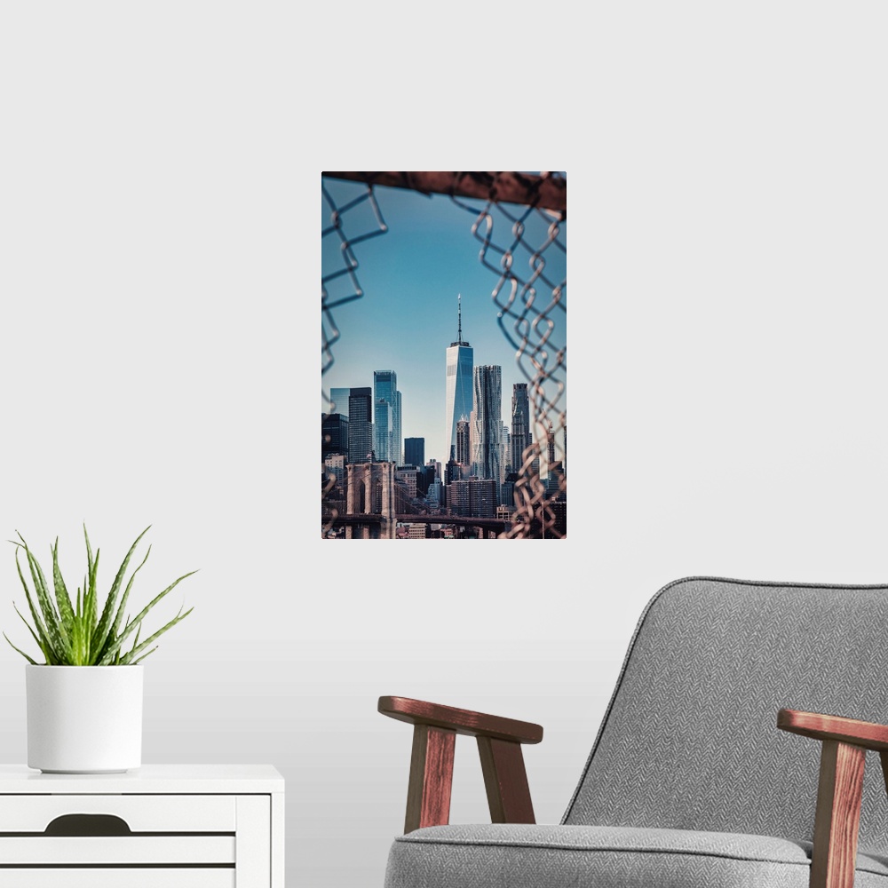 A modern room featuring New York City, East River Scene with Lower East Side skyline viewed from Manhattan Bridge.