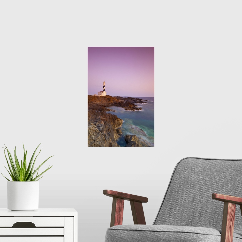 A modern room featuring Spain, Minorca, Far de Favaritx lighthouse and rugged coastline at dawn
