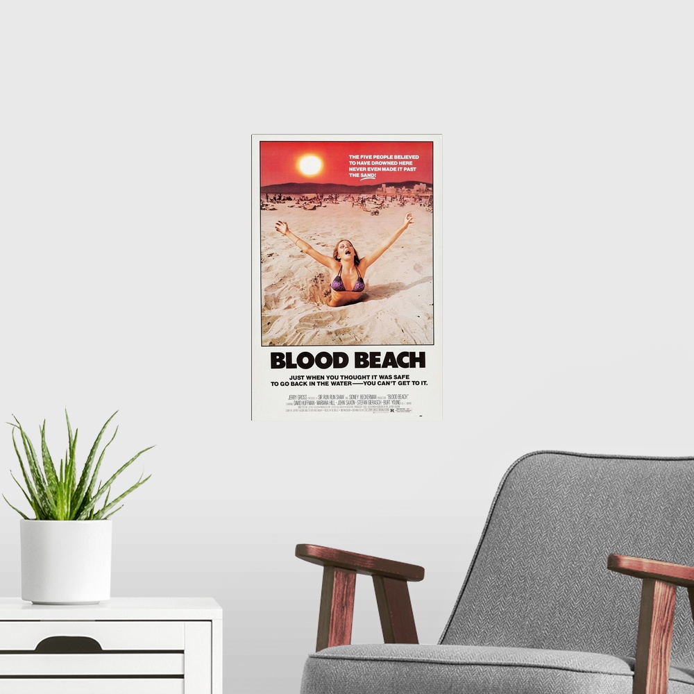 A modern room featuring BLOOD BEACH, U.S. poster art, 1980, ..The Jerry Gross Organization/courtesy Everett Collection