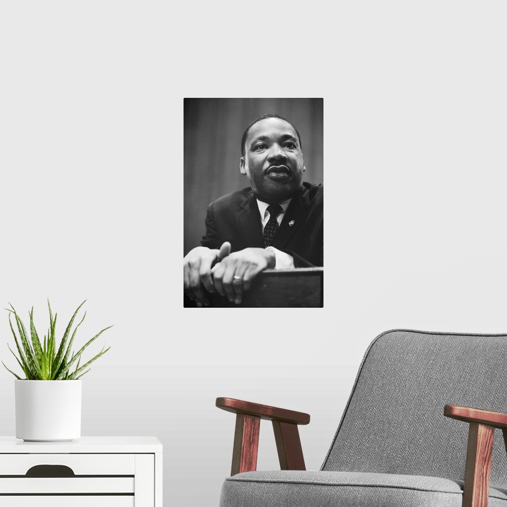 A modern room featuring Martin Luther King at a press conference in Washington, D.C. on March 26, 1964.