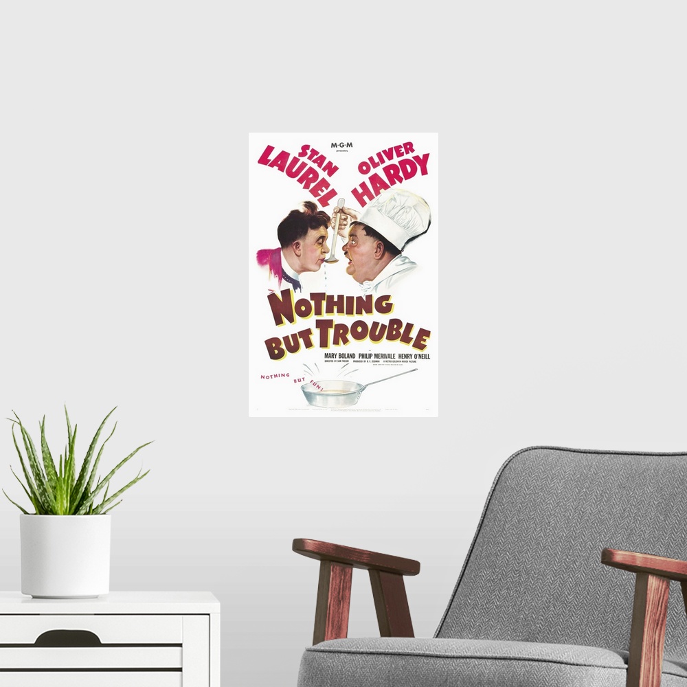 A modern room featuring Nothing but Trouble - Vintage Movie Poster