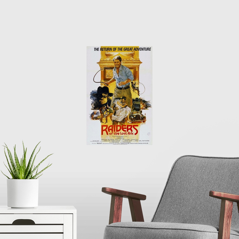 A modern room featuring RAIDERS OF THE LOST ARK, British poster art, Harrison Ford, (center), 1981.