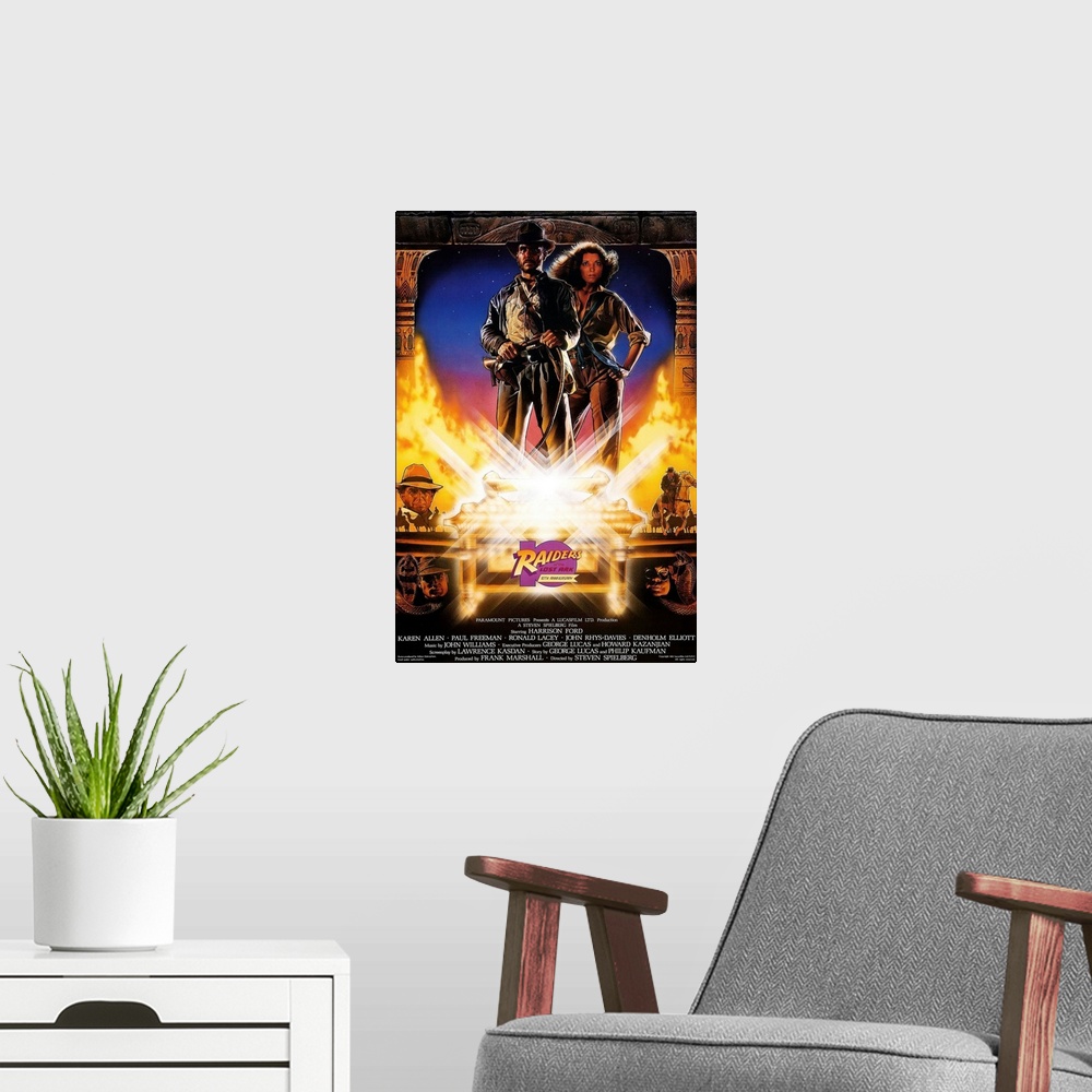 A modern room featuring RAIDERS OF THE LOST ARK, US 10th anniversary re-issue poster, top, from left: Harrison Ford, Kare...