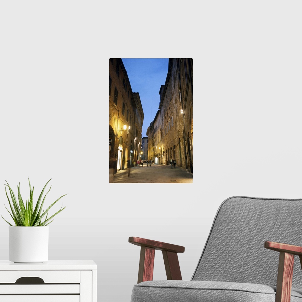 A modern room featuring Streets of the city center at sunset. Siena, Italy