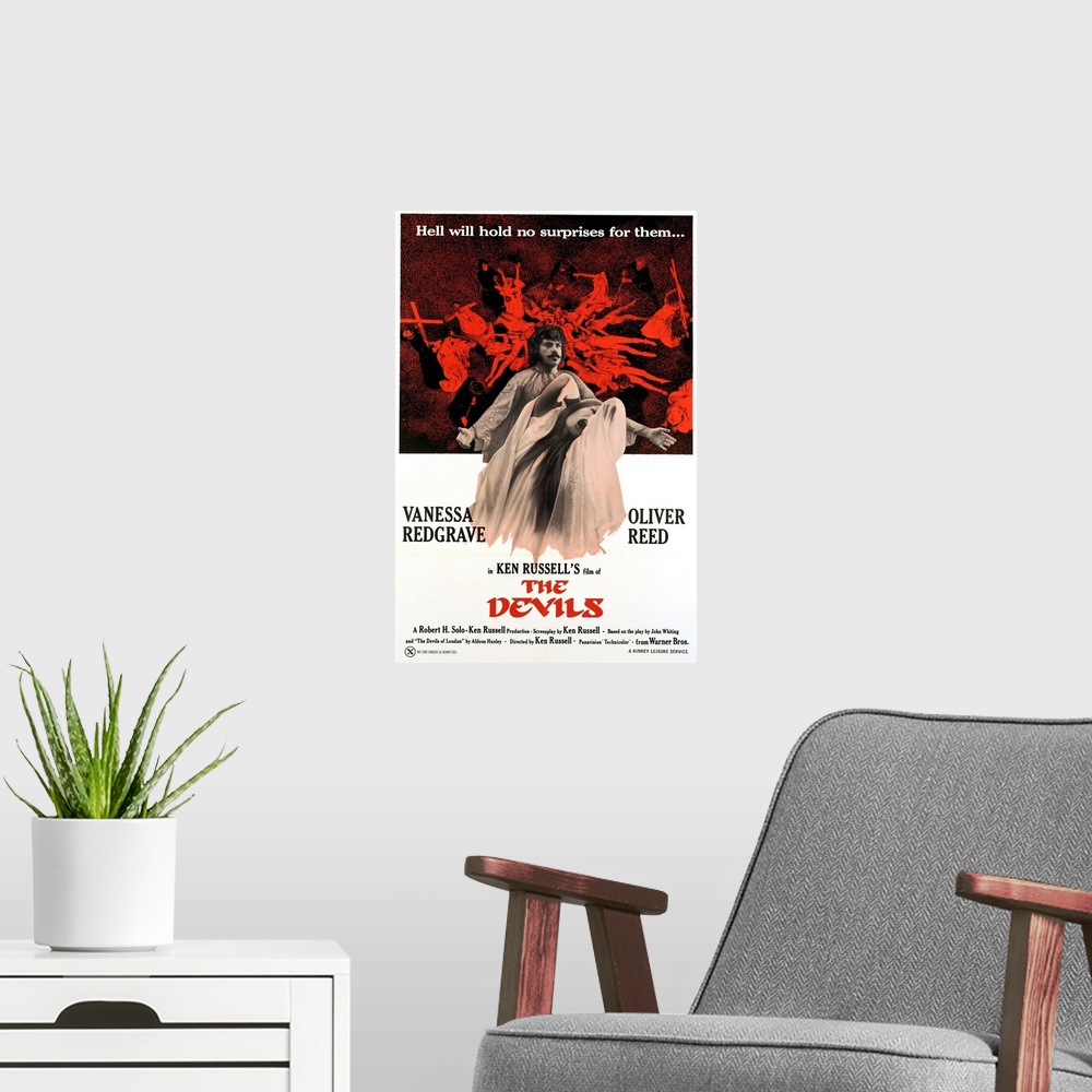 A modern room featuring The Devils - Movie Poster