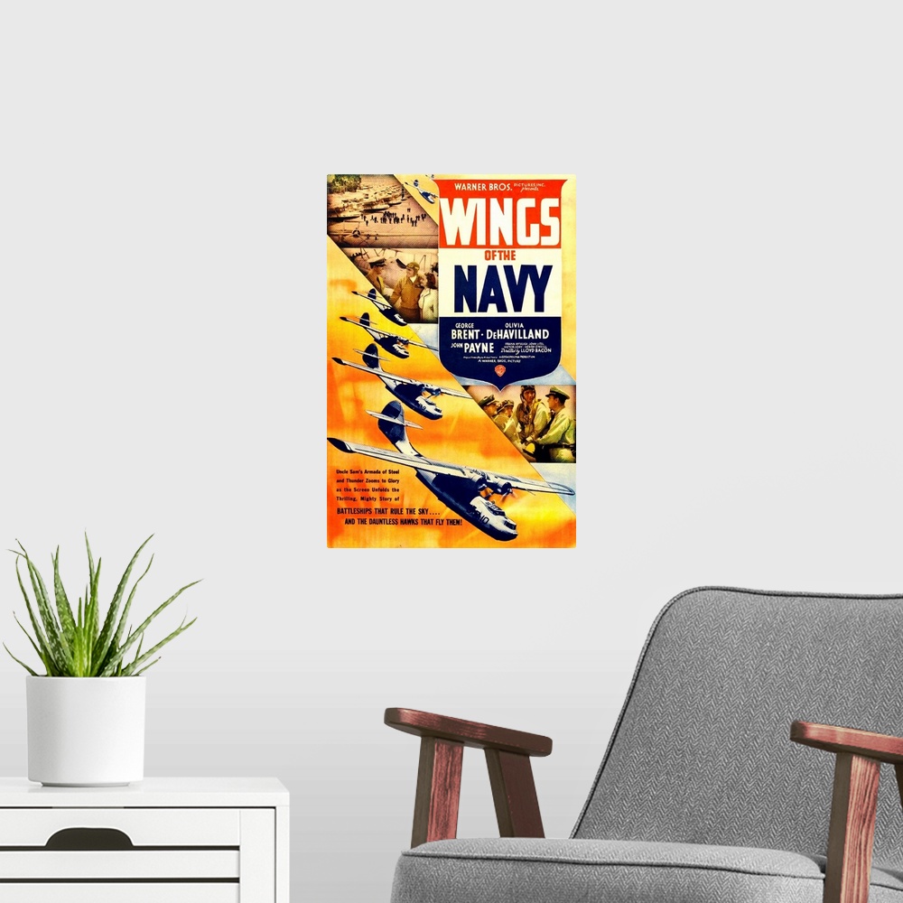 A modern room featuring WINGS OF THE NAVY, US poster, top from left: John Payne, George Brent, Olivia DeHavilland, 1939