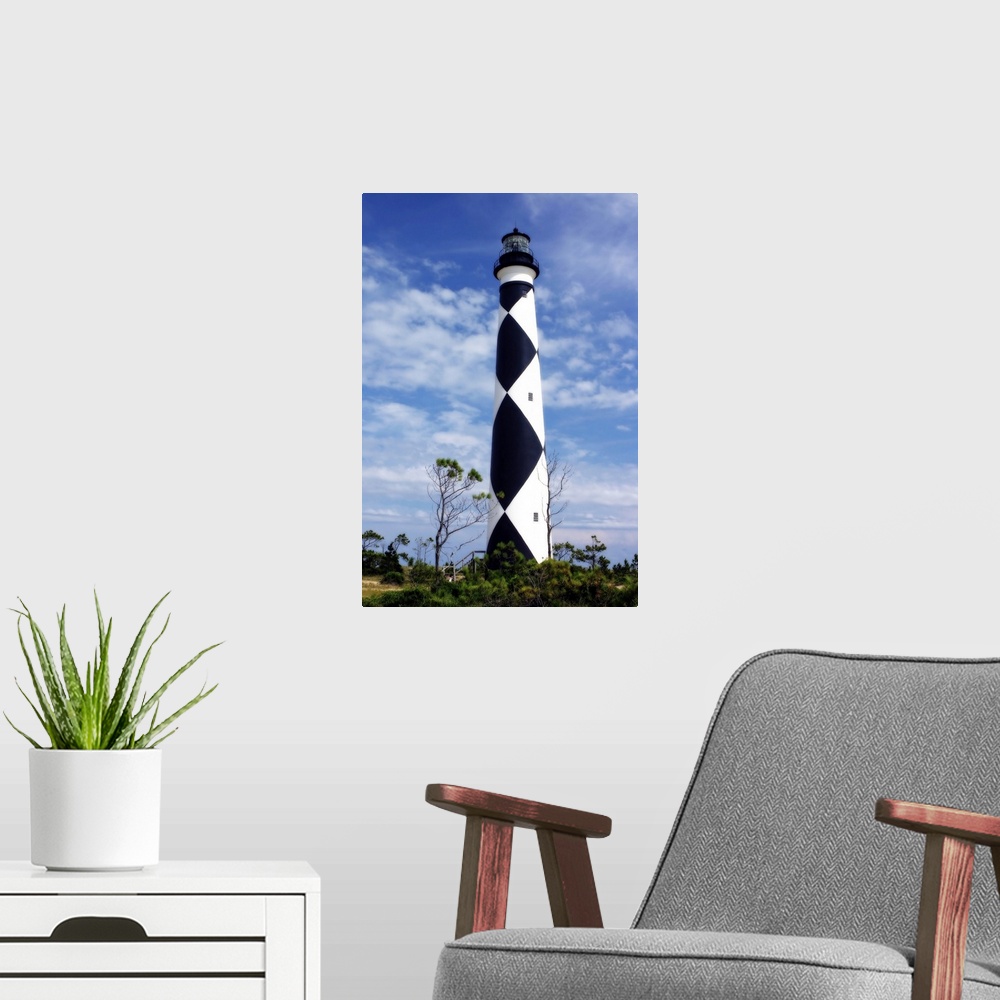 A modern room featuring Cape Lookout Lighthouse