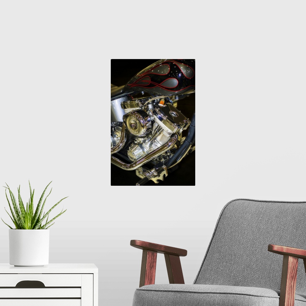 A modern room featuring Fine art photograph of the engine and pipes of a vintage motorcycle.