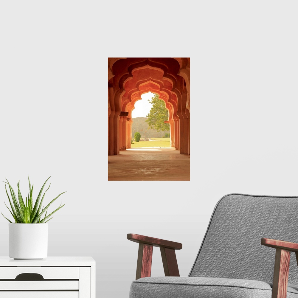 A modern room featuring Vertical photograph of the decorative doorways of the Lotus Temple in Hampi, Karnataka, India.