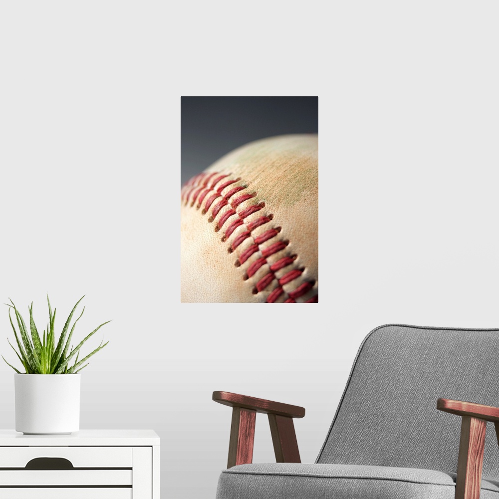 A modern room featuring Baseball with impact mark.