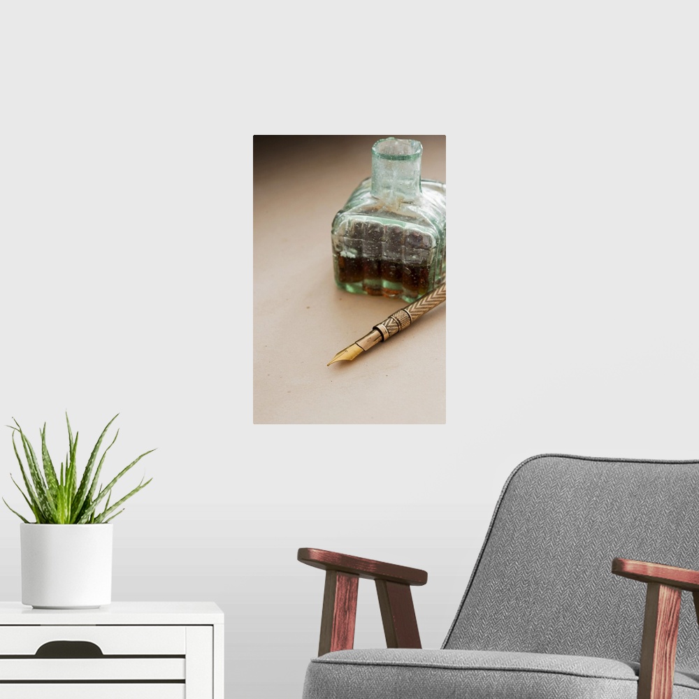 A modern room featuring Close up antique ink well and pen