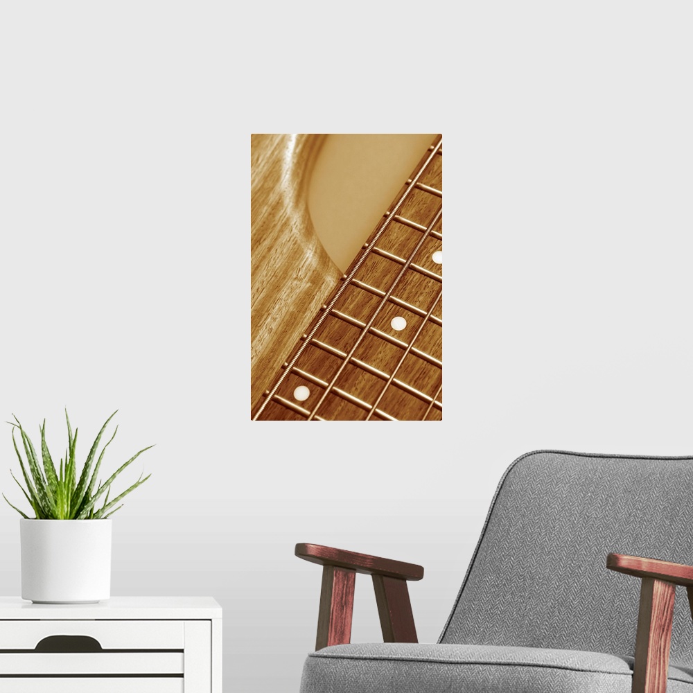 A modern room featuring Close-up of guitar bridge