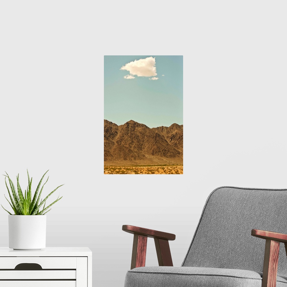 A modern room featuring Cloud over Nevada desert and mountains
