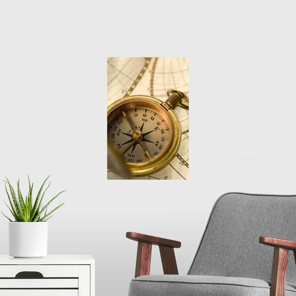 A modern room featuring Compass on antique map