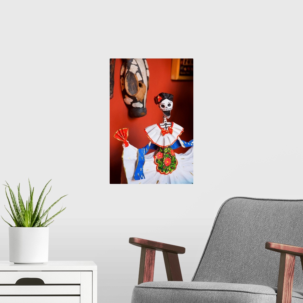 A modern room featuring Day Of The Dead Papier Mache Figurine