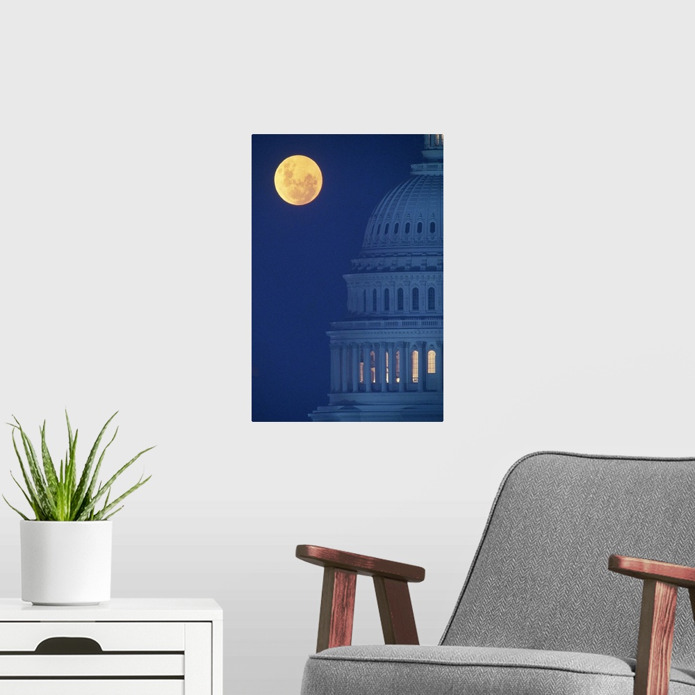 A modern room featuring Dome of Capitol Building with full moon