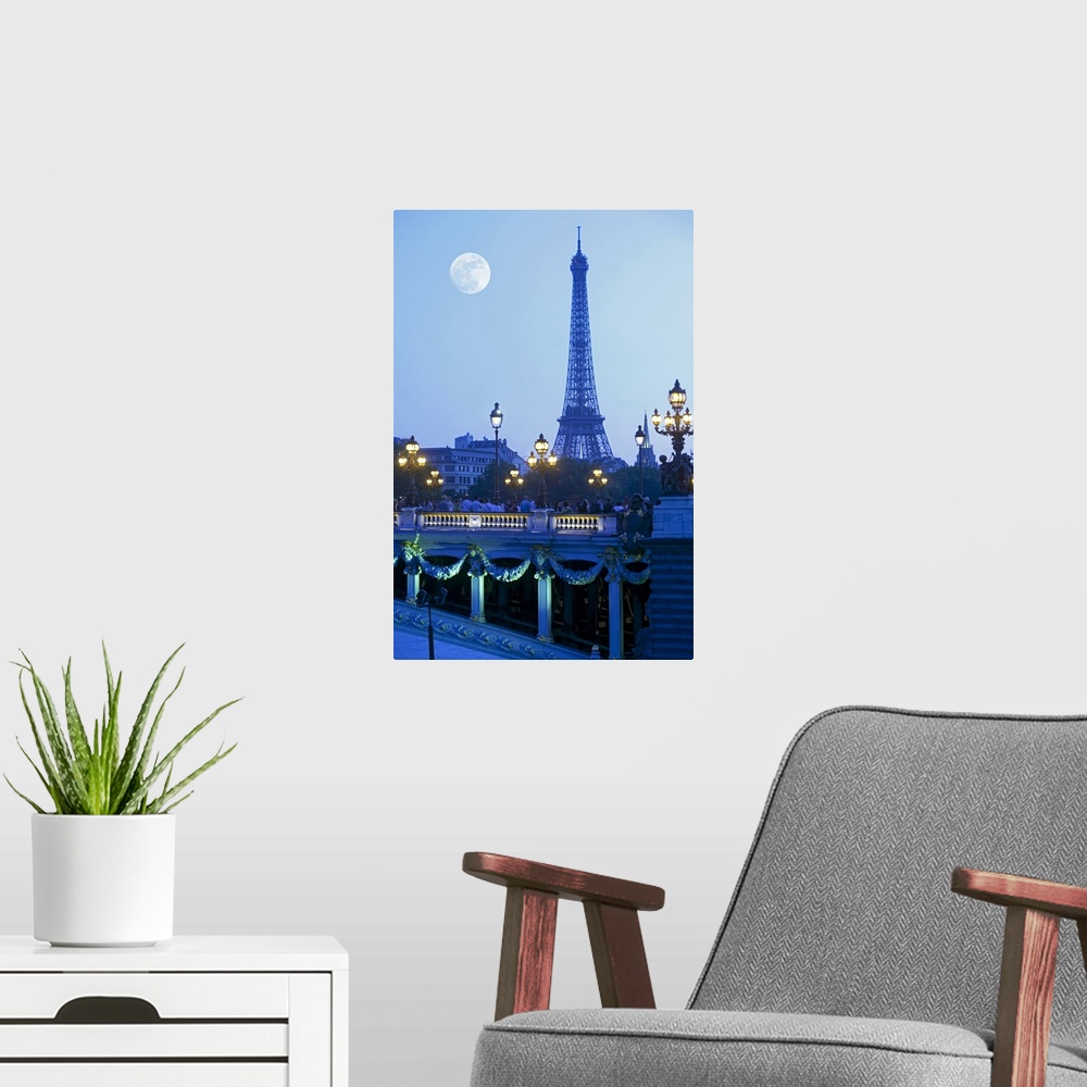 A modern room featuring Evening view of Eiffel Tower at moonrise
