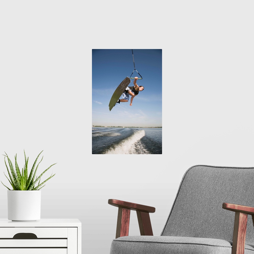 A modern room featuring Midair wakeboarder