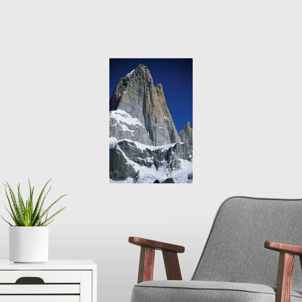 A modern room featuring The peaks of Mount Fitz Roy in the Patagonian Andes.