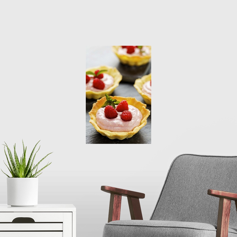 A modern room featuring Raspberry tarts, close-up