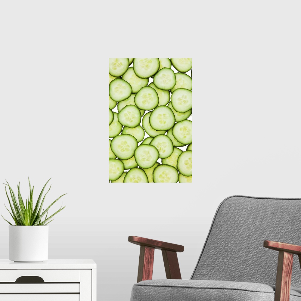 A modern room featuring Full frame of sliced cucumber, on white background, cut out