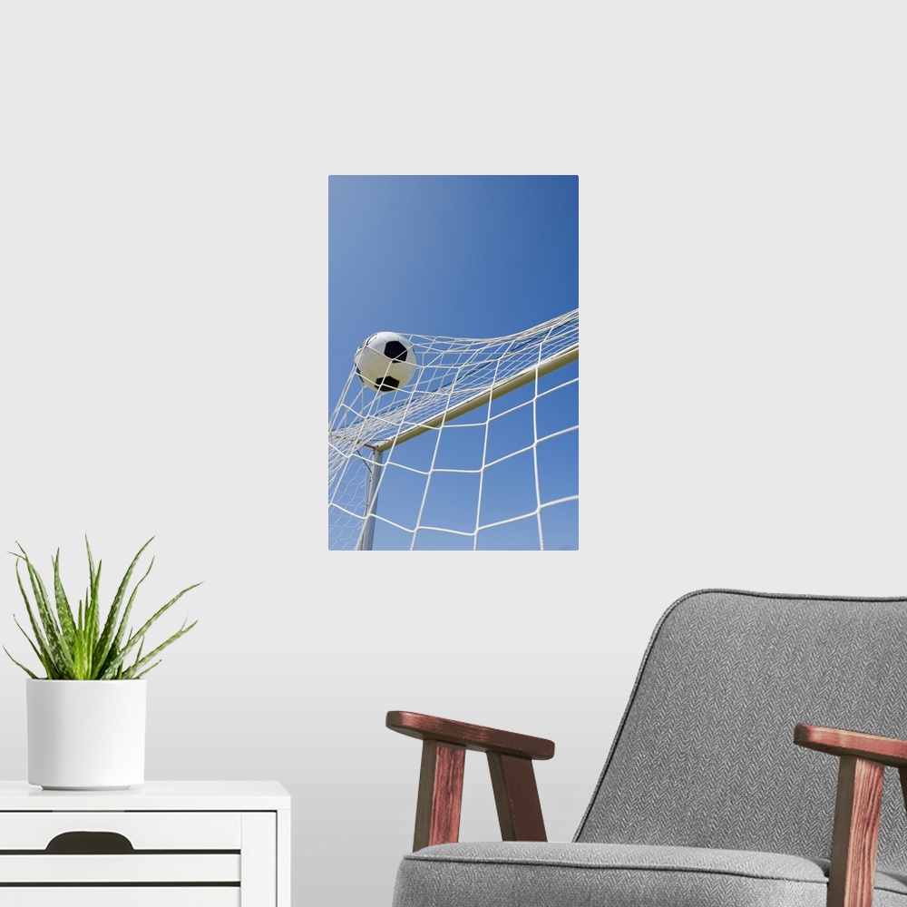 A modern room featuring Soccer ball and goal