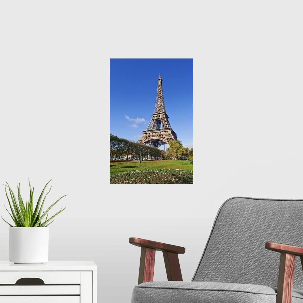 A modern room featuring The Eiffel Tower with early Autumn gardens