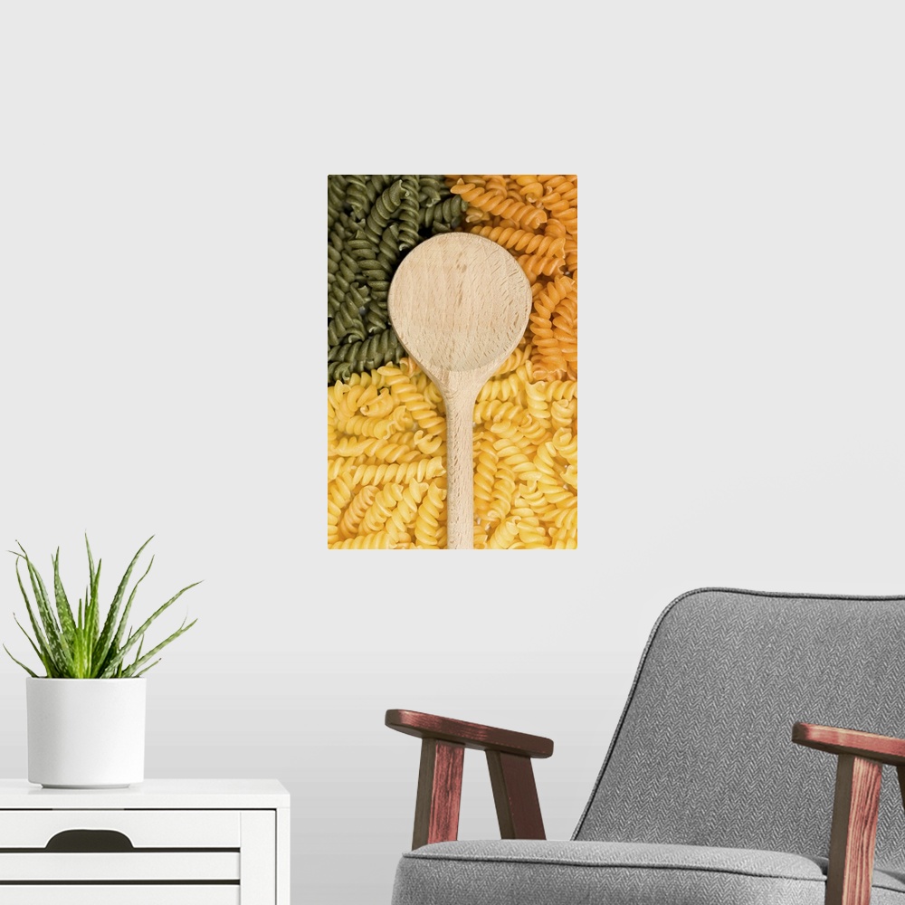 A modern room featuring Wooden spoon, green and yellow noodles