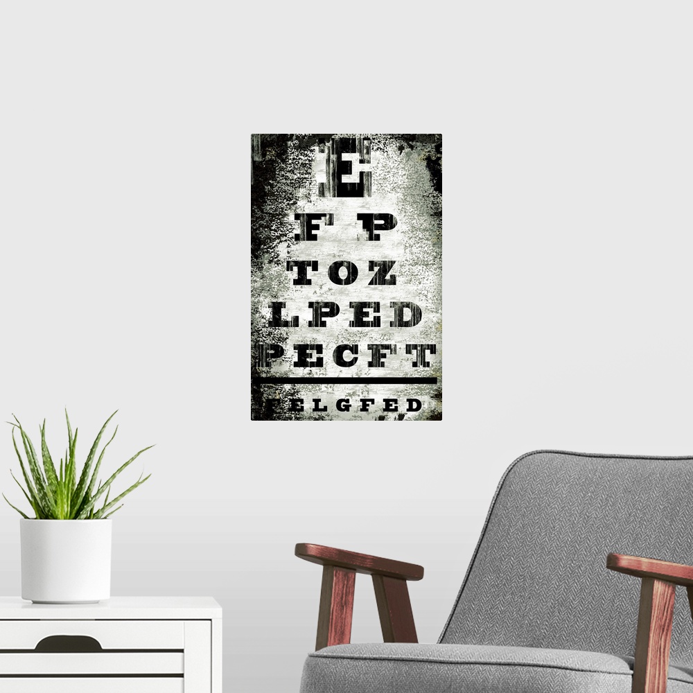 A modern room featuring This is an artistic and distressed recreation of a doctoros eyechart as a vertical poster.