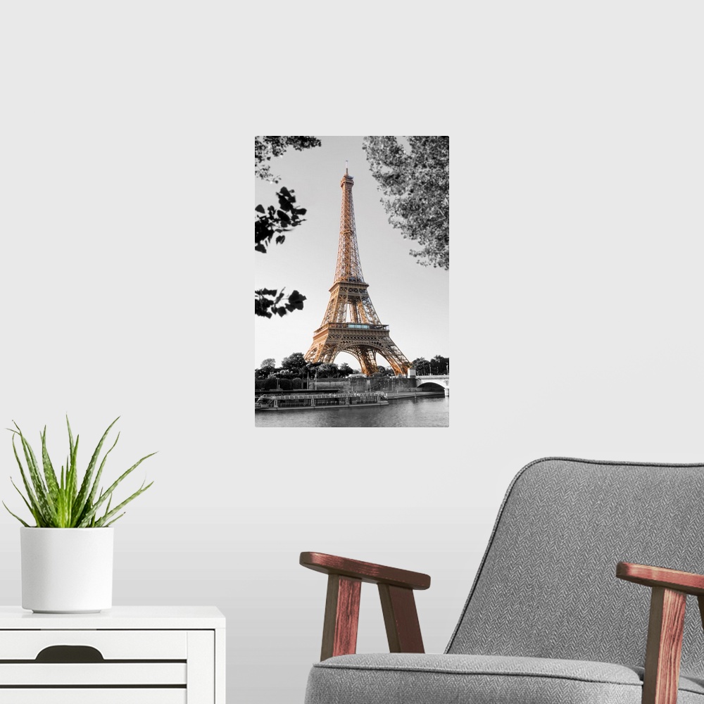 A modern room featuring Photograph of the Eiffel Tower with the background in black and white.