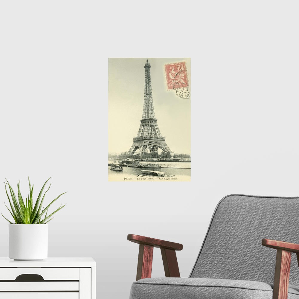 A modern room featuring Vintage postcard of the Eiffel Tower in Paris, France, with a postage stamp on the front.