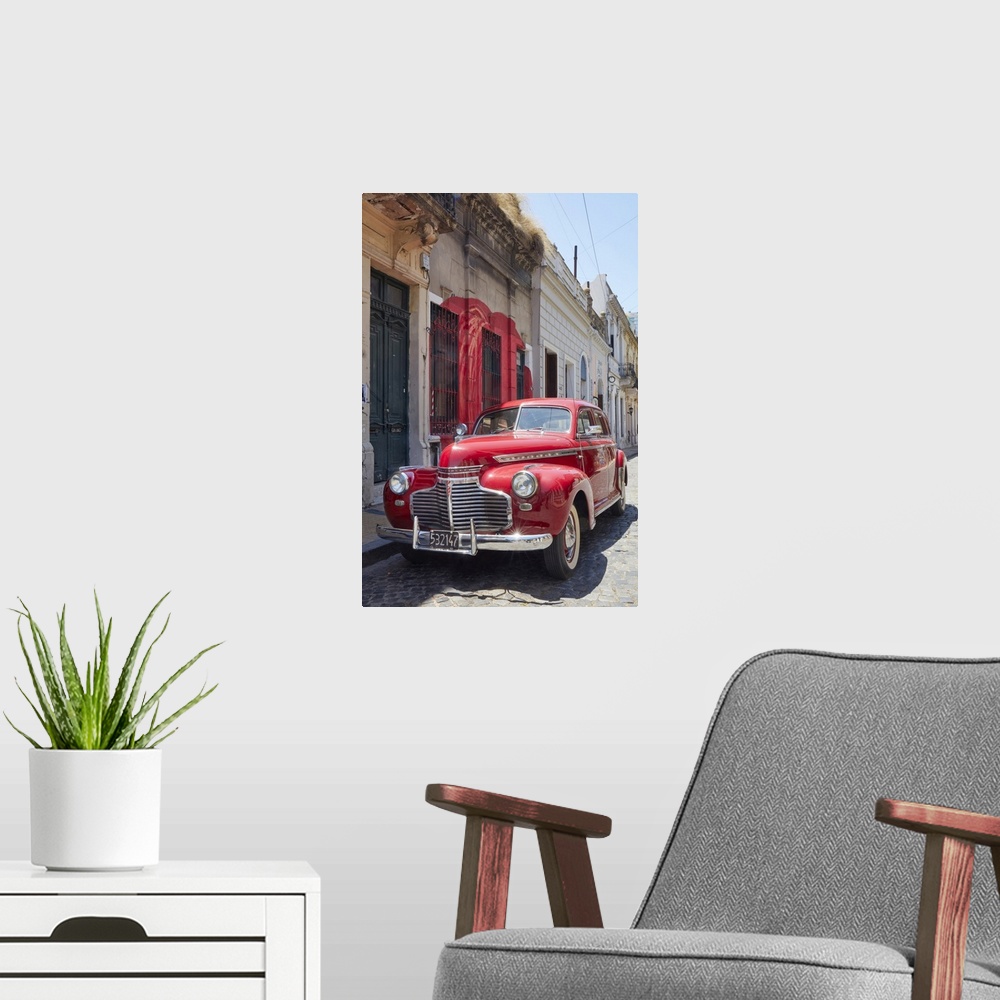 A modern room featuring A vintage Chevrolet Master Deluxe car in front of a colonial house in San Telmo, Buenos Aires, Ar...
