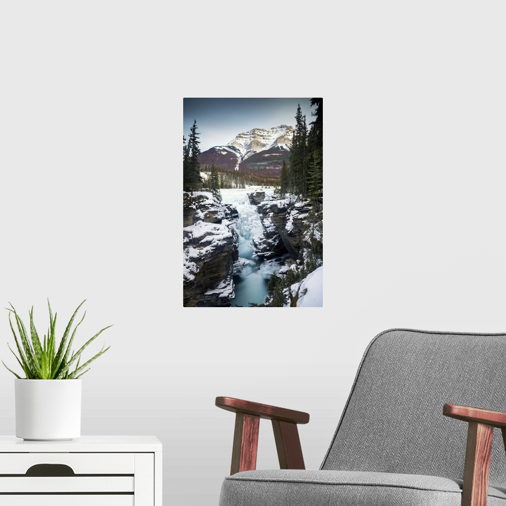 A modern room featuring Athabasca Falls in Winter,  Alberta, Canada.