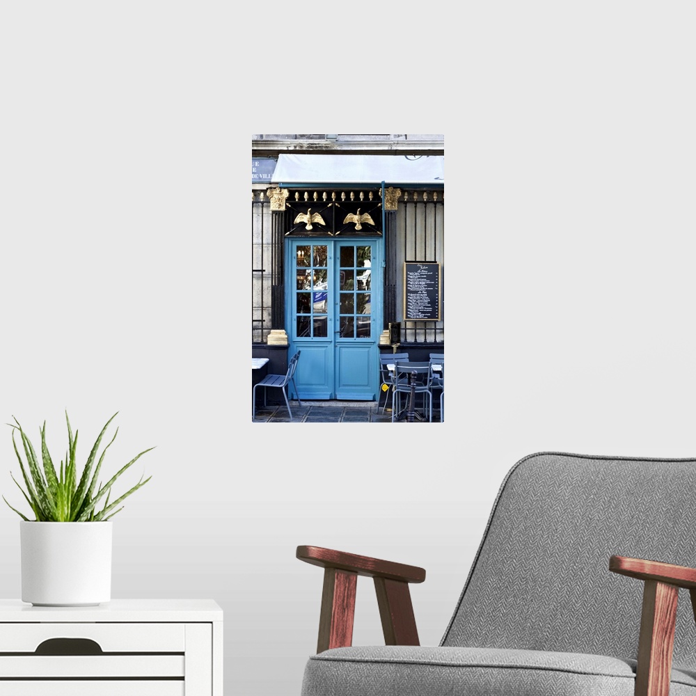 A modern room featuring Blue doors of cafe, Marais District, Paris, France