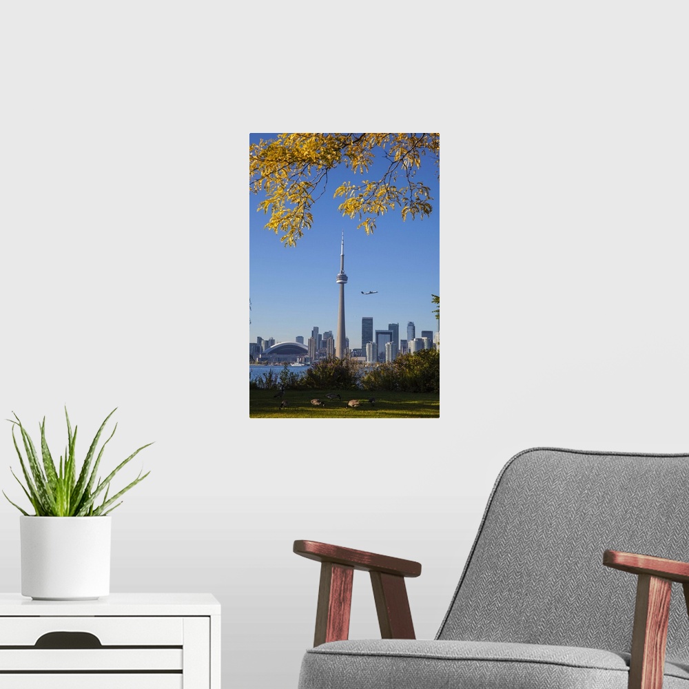 A modern room featuring Canada, Ontario, Toronto, View of CN Tower and city skyline from Center Island