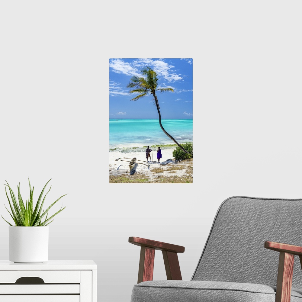 A modern room featuring Couple of Maasai with dhow admiring the crystal sea standing on a palm fringed beach, Zanzibar, T...